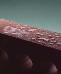 Repellant surface formed with Ultraproof to prevent moisture penetration into wood and masonry
